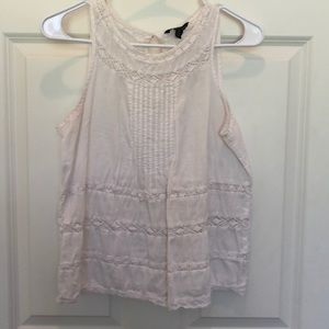 White sleeveless top